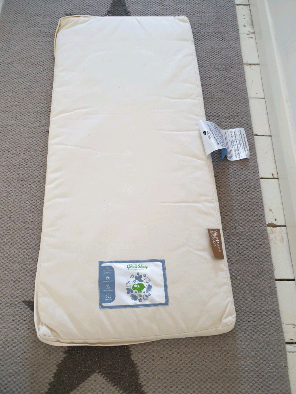 green sheep mattress protector